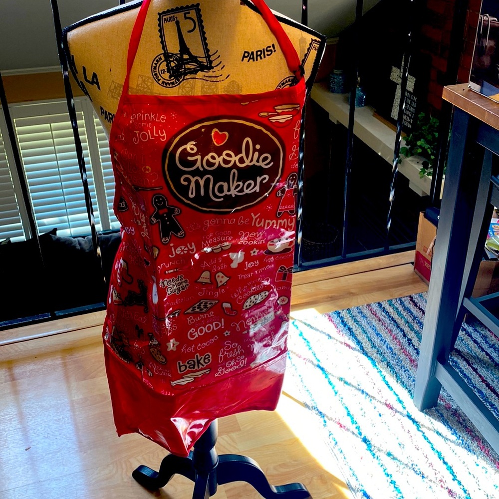 Red Christmas apron with “Goodie Maker” written in big letters